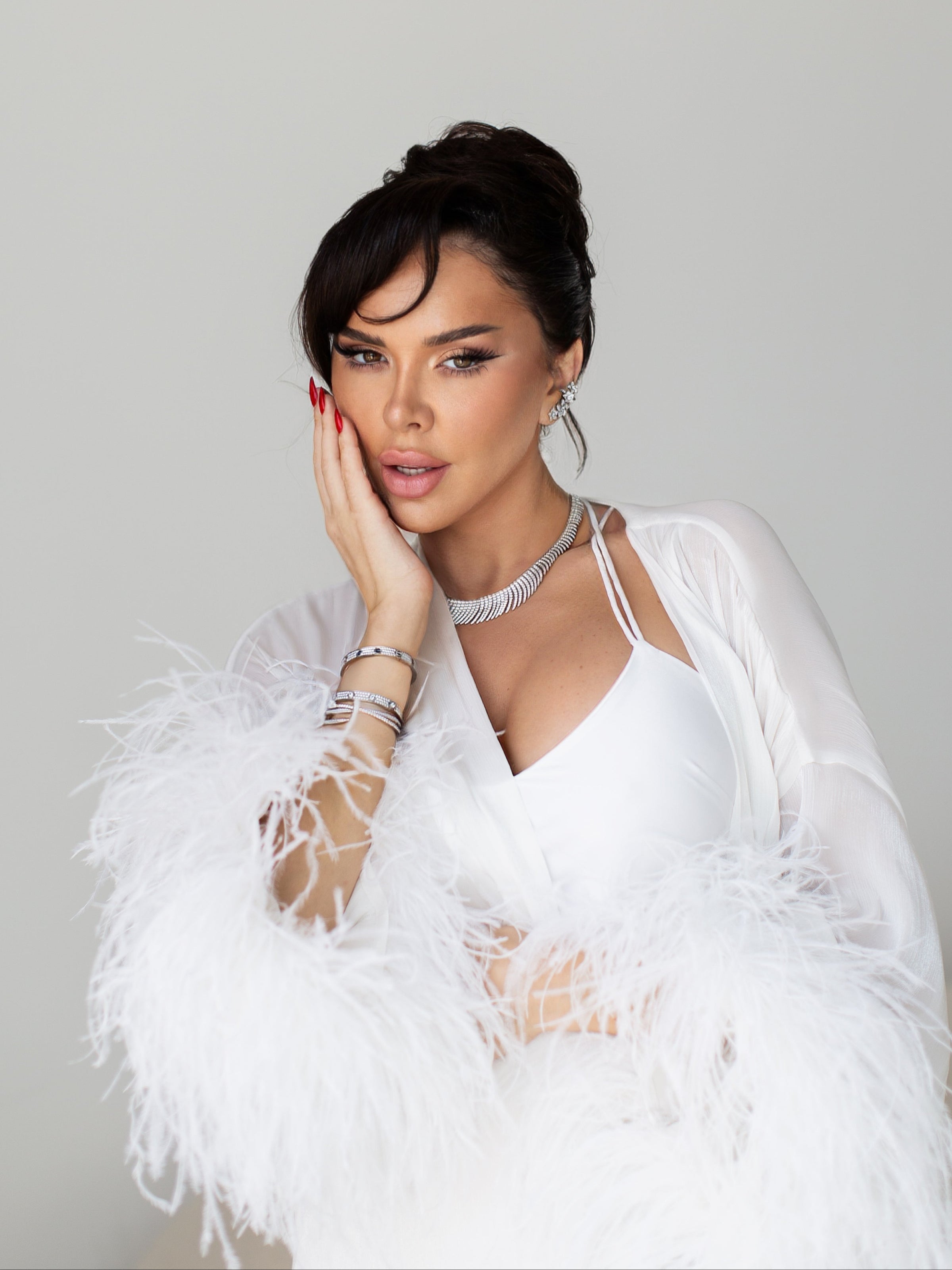 Cape with the feathers