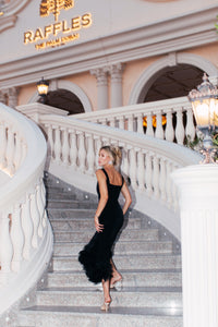 Black midi dress with the feathers